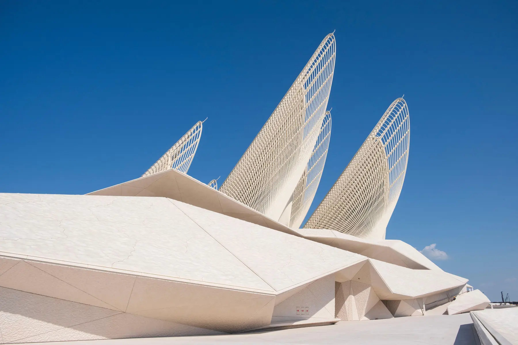 White geometric exterior and towers of Zayed National Museum