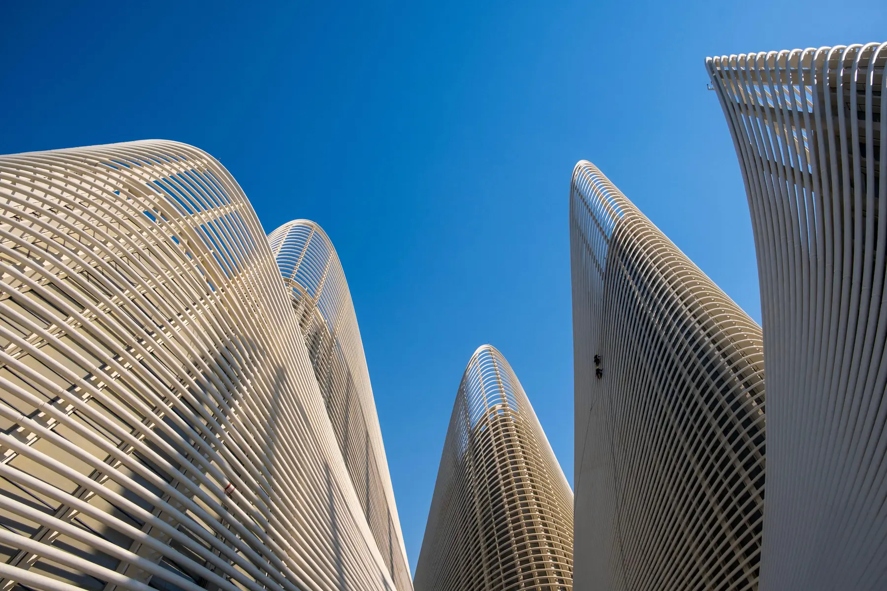 Looking up between the Zayed National Museum towers